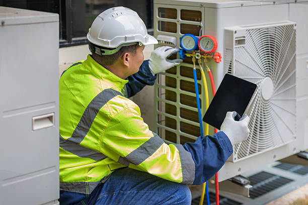 Professional Air Duct Cleaning technician working in Halifax, VA